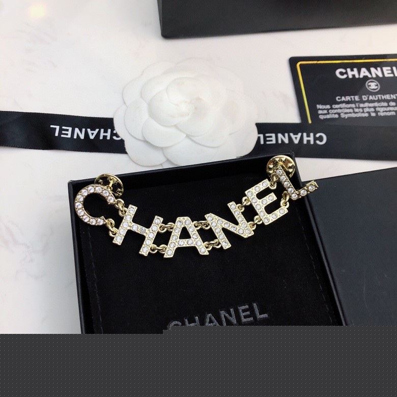 Ch*el brooches